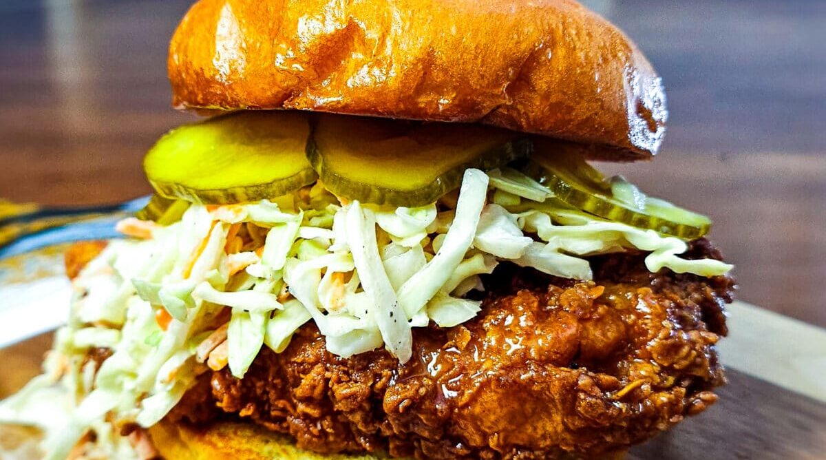 Fried Buttermilk Sandwich with cole slaw and pickles.