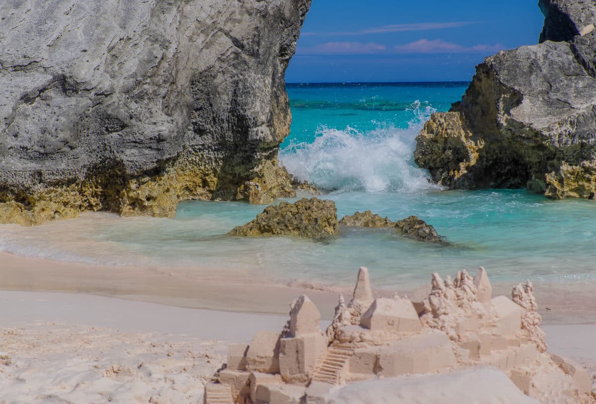 Scenic view of Horseshoe Bay with waves crashing between large rocks