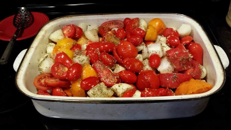 Fresh tomatoes, peppers, and spices ready for cooking