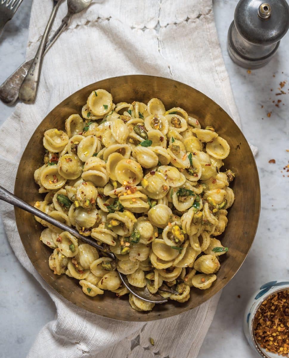 Bowl of pasta with pistachios and anchovies