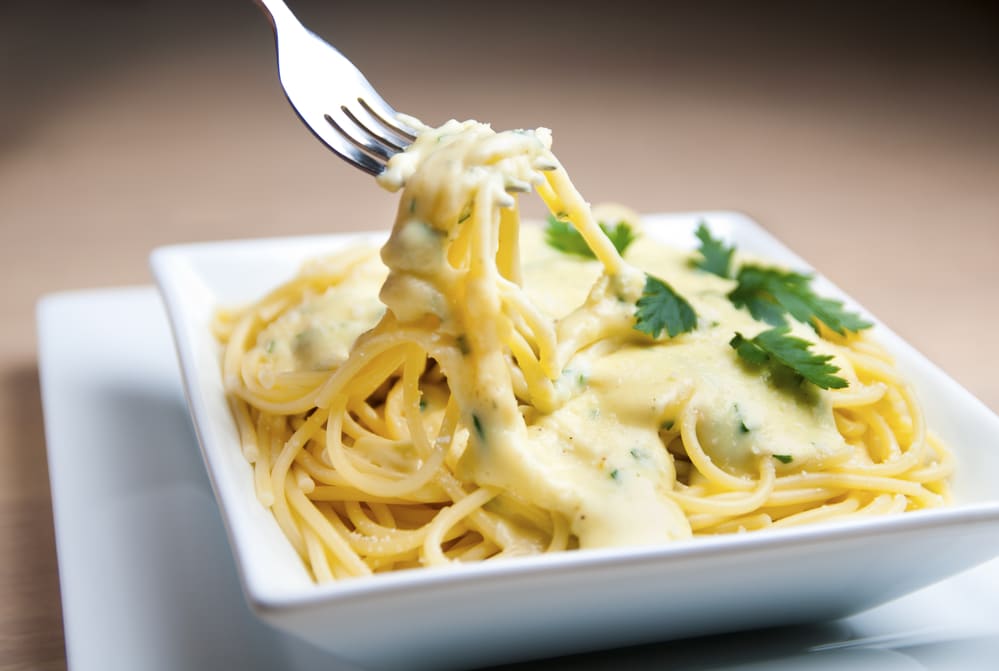 Close-up of spaghetti with vegan sauce and fresh parsley